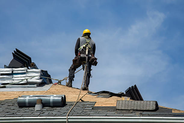 Professional Storm Damage Roof Repair technician working in Barre, MA